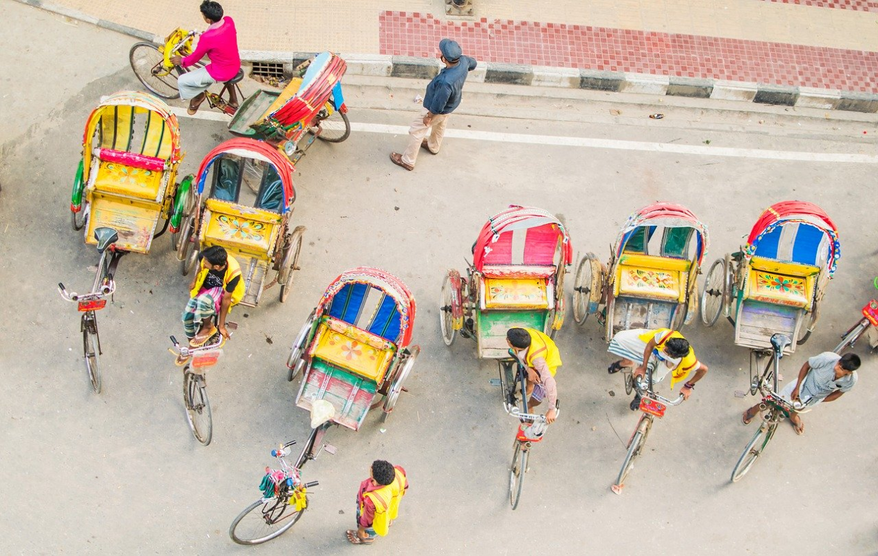 People with their Cycle rickshaws