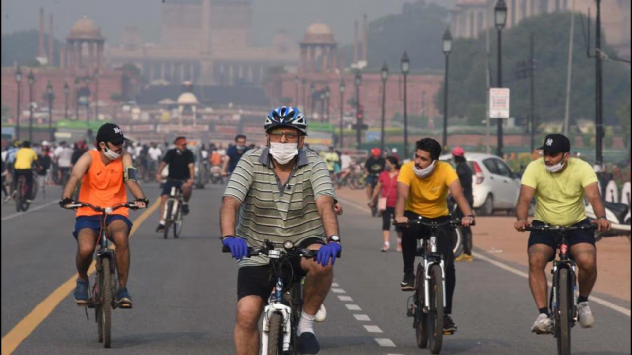 People cycling in from of Lal Quila