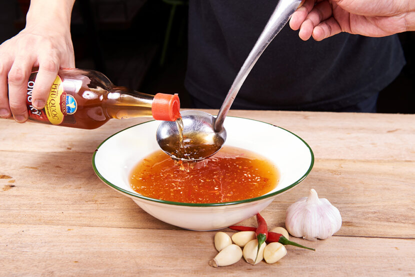 man cooking with Phu Quoc Fish Sauce